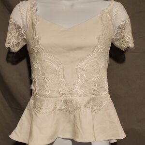 Bebe NWT Cream Peplum Blouse with Embellished Short Sleeves